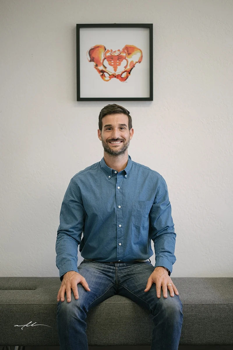 Dr. Nick Deliberato seated in the practice